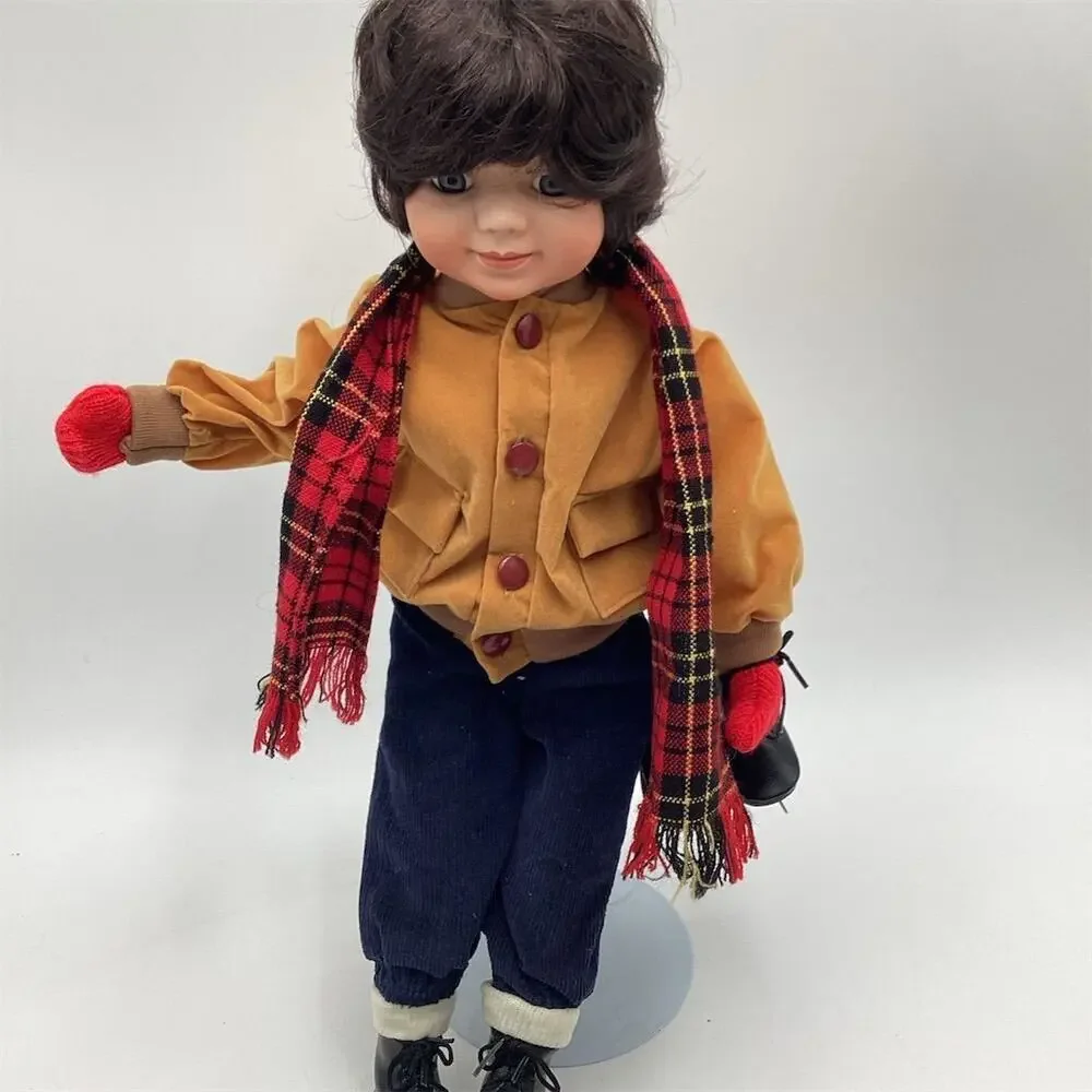 A Vintage Porcelain Boy Doll 16”with Ice Skates‎ Winter Theme